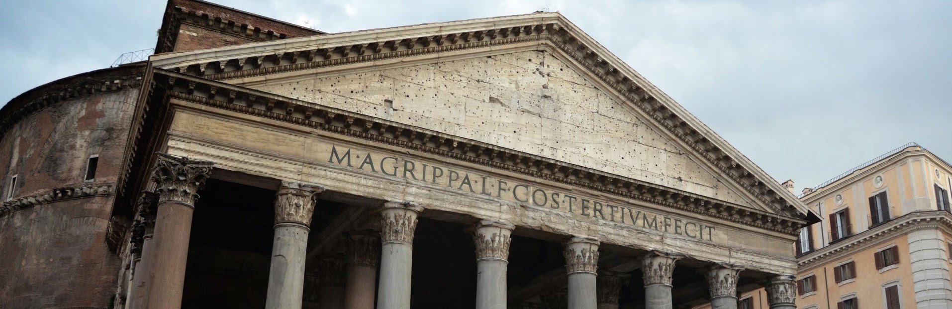 cropped triangular front of the pantheon in rome